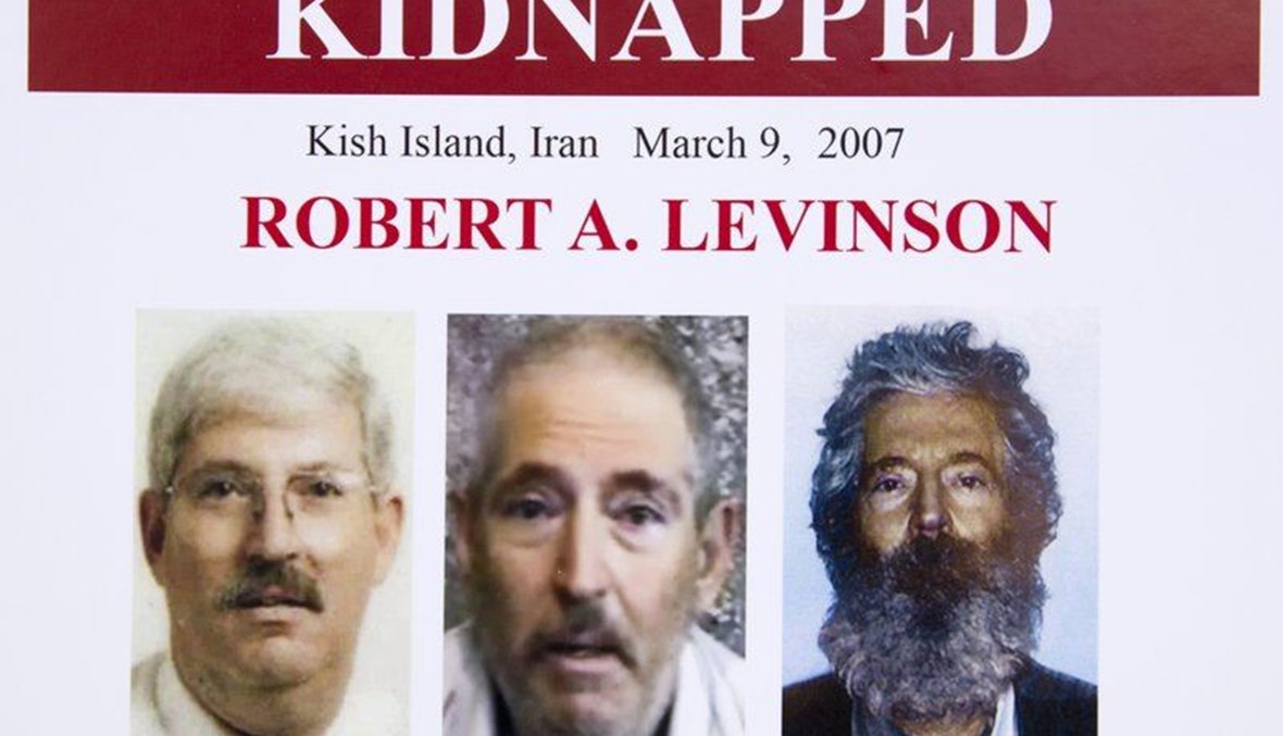  In this March 6, 2012, an FBI poster showing a composite image of former FBI agent Robert Levinson, right, of how he would look like now after five years in captivity, and an image, center, taken from the video, released by his kidnappers, and a picture before he was kidnapped, left, displayed during a news conference in Washington. (AP Photo)