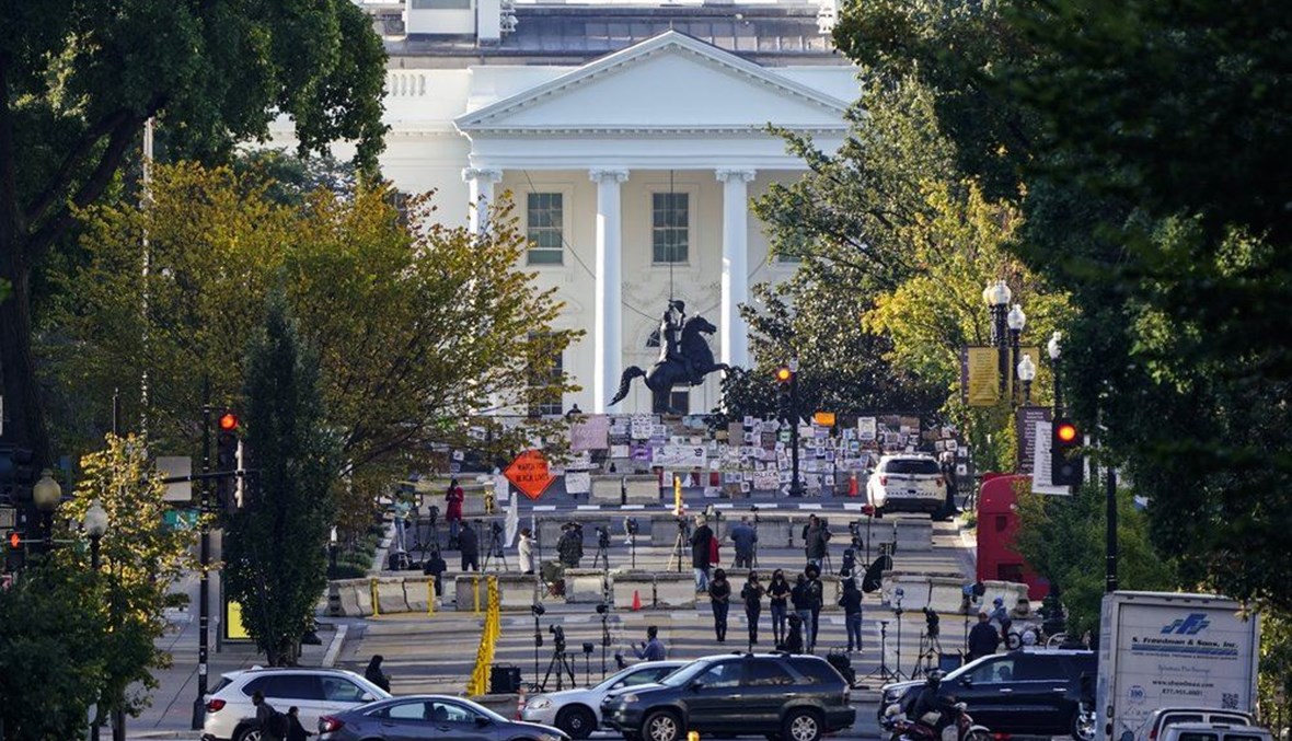 The White House is seen in Washington, early Tuesday, Oct. 6, 2020. (AP Photo)