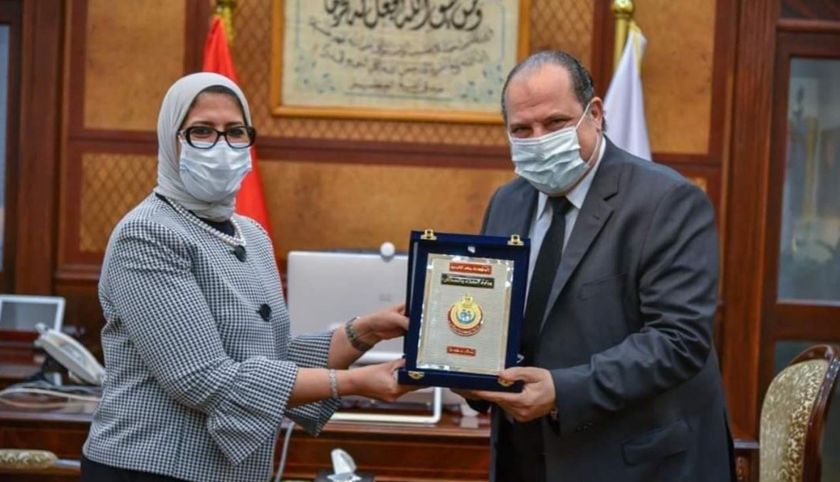 خالد الصاوي ووزيرة الصحة المصرية.