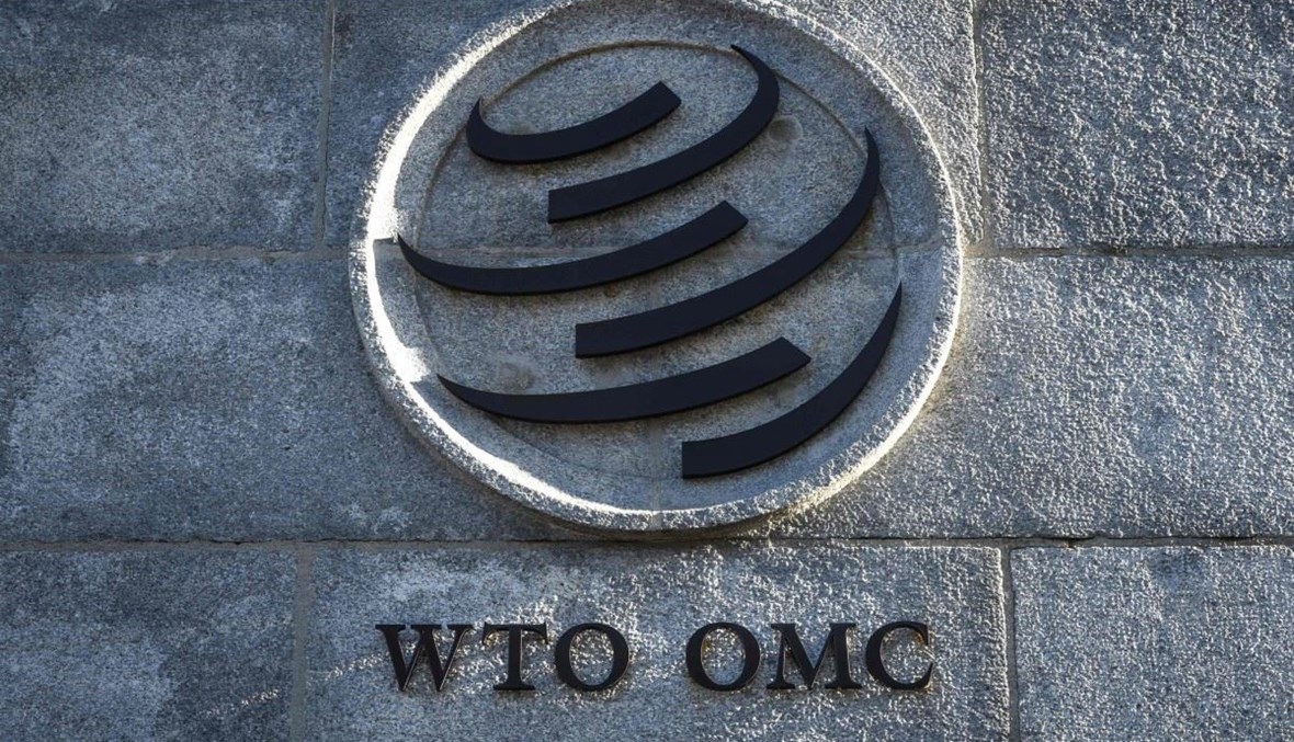 شعار منظمة التجارة العالمية عند مدخل مقرها في جنيف (أ ف ب). 