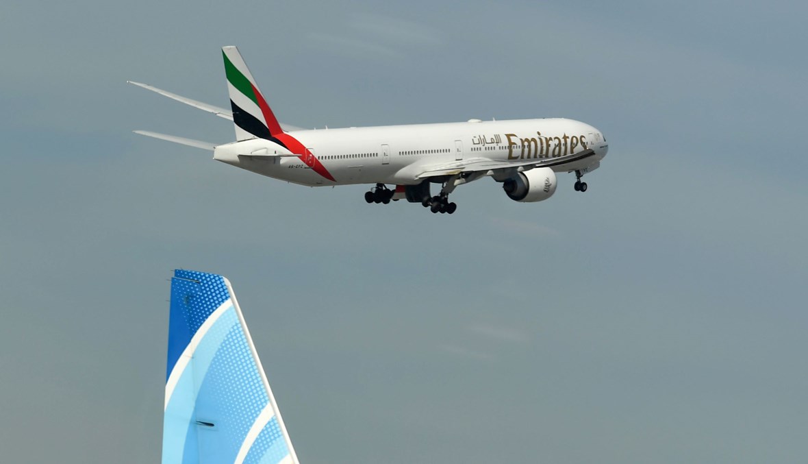 طائرة تابعة لطيران الإمارات تقلع من مطار دبي الدولي (6 نيسان 2020، أ ف ب.) 