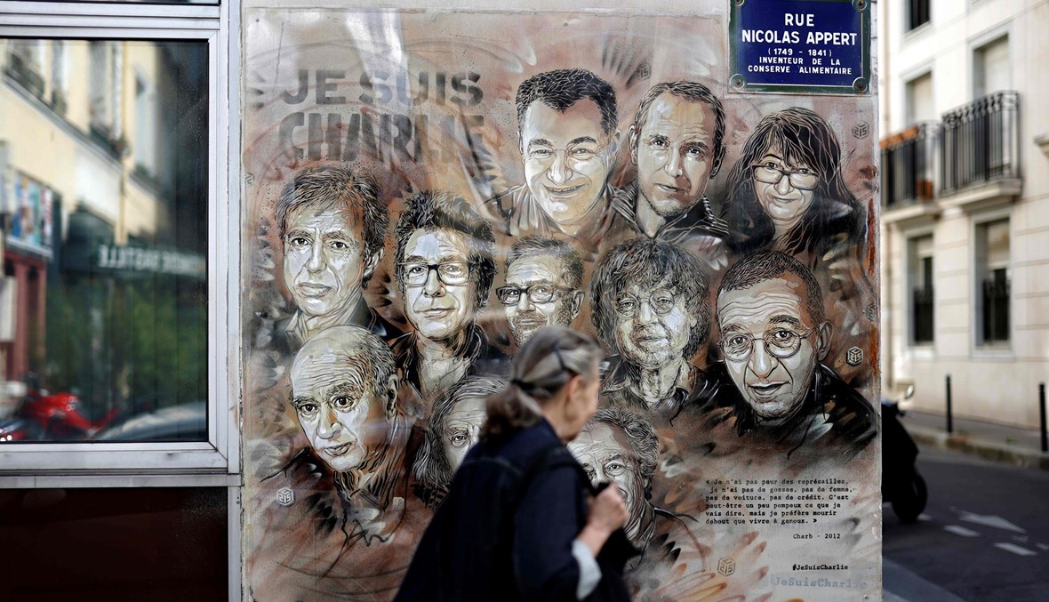 جدارية لضحايا اعتداء "شارلي إبدو" في شارع نيكولا أبير، شرق باريس (أ ف ب).