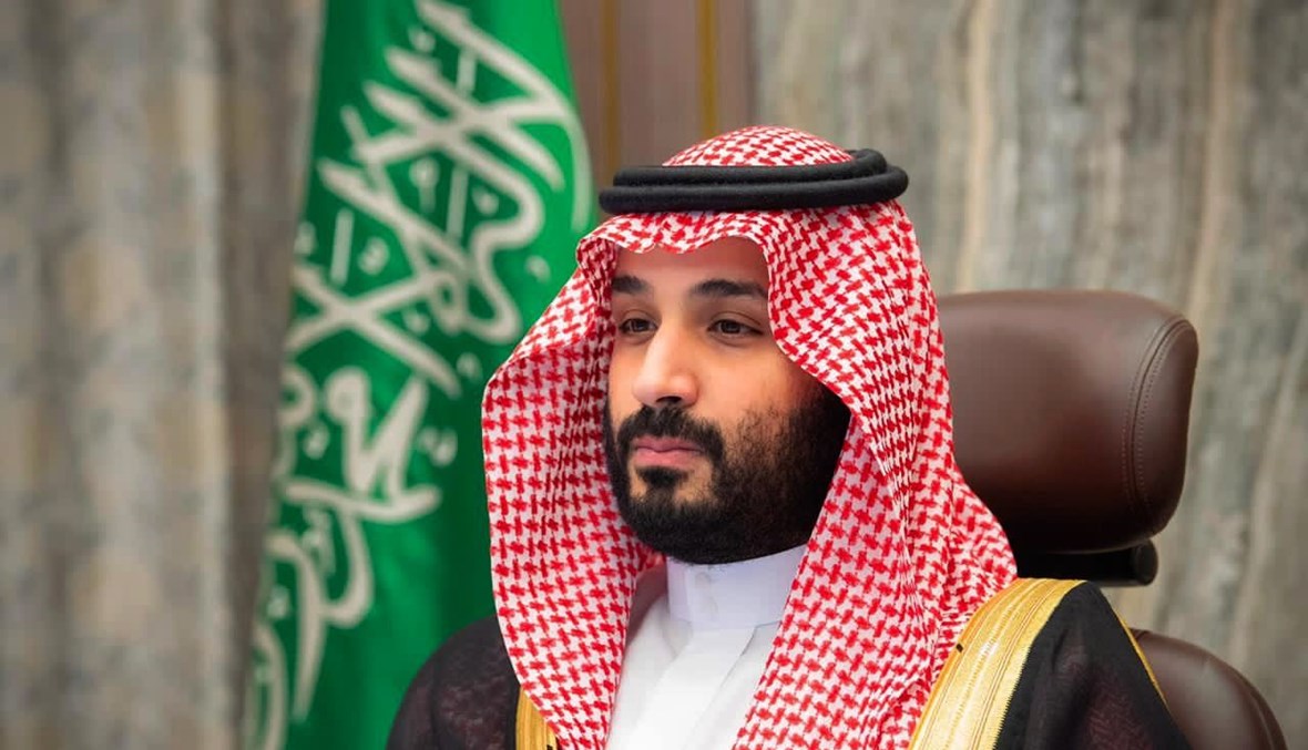 الأمير محمد بن سلمان خلال حضوره اجتماعا عبر الفيديو لمجلس الشورى في العاصمة الرياض (12 ت2 2020، أ ف ب). 