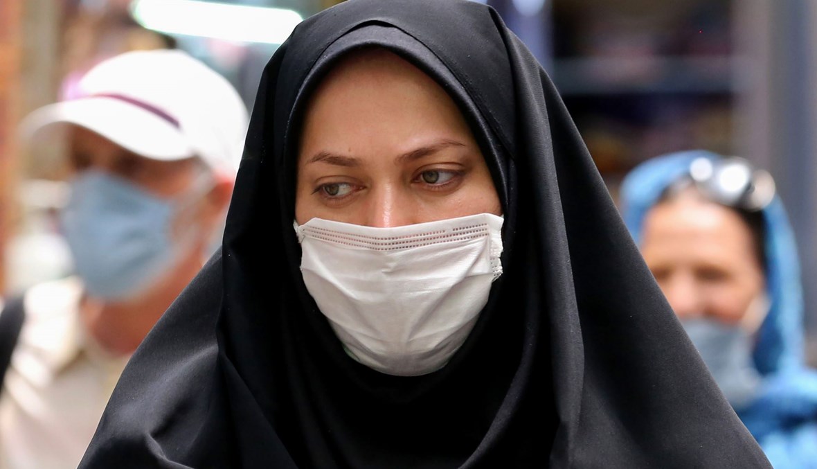 امرأة إيرانية تضع قناعاً واقياً من كورونا في طهران (تعبيرية- أ ف ب).