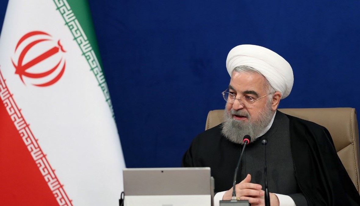 الرئيس الايراني حسن روحاني يتحدث في اجتماع الحكومة الايرانية بطهران أمس.(أ ف ب)     