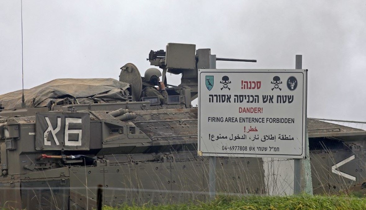آلية عسكرية إسرائيلية حلال تدريبات في مرتفعات الجولان السورية المحتلة.(أ ف ب)