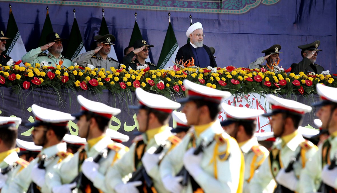 الرئيس الإيراني حسن روحاني يحضر استعراضاً عسكرياً بمناسبة الذكرى 38 لاندلاع الحرب الإيرانية-العراقية، أيلول 2018 - "أ ب"