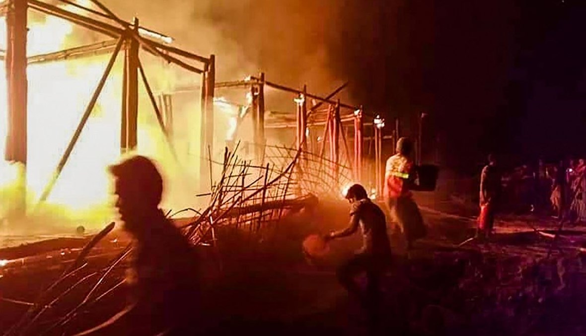 حريق مدارس "اليونيسف" في مخيمات للروهينغا في بنغلادش (أ ف ب).
