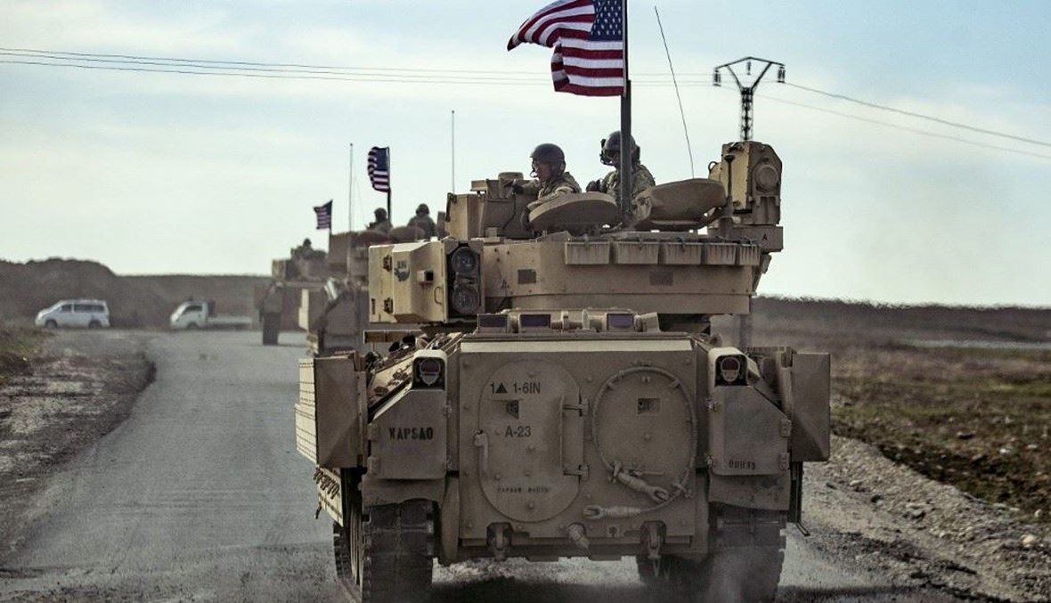 جنود أميركيون قرب معبر سيمالكا الحدودي بين سوريا وكردستان العراق.   (أ ف ب) 