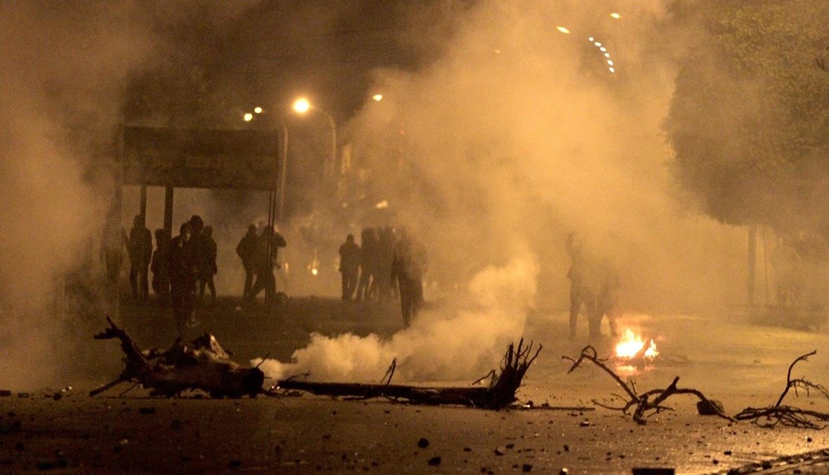 اشتباكات بين متظاهرين وقوات الأمن خلال احتجاج بمدينة سليانة التونسية (أ ف ب).
