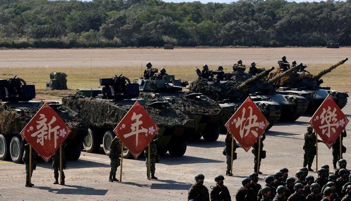 جنود في الجيش التايواني خلال تدريب في قاعدة هسينشو العسكرية قبل عطلة رأس السنة الصينية (19 ك2 2021، أ ف ب).