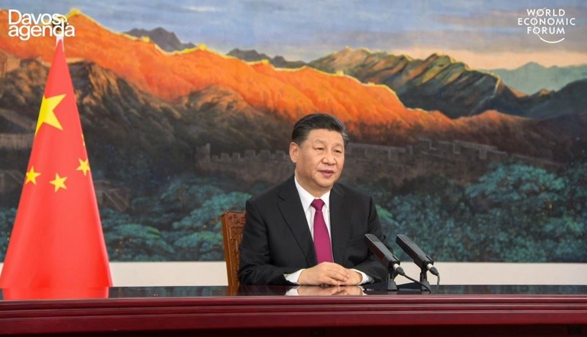 الرئيس الصيني شي جينبينغ يتحدث افتراضياً أمام منتدى دافوس بسويسرا أمس.(أ ف ب)