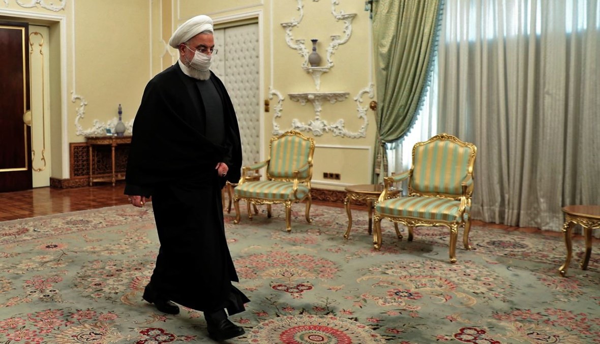 الرئيس روحاني لدى وصوله للقاء وزير الخارجية العراقي في طهران (3 شباط 2021، أ ف ب). 