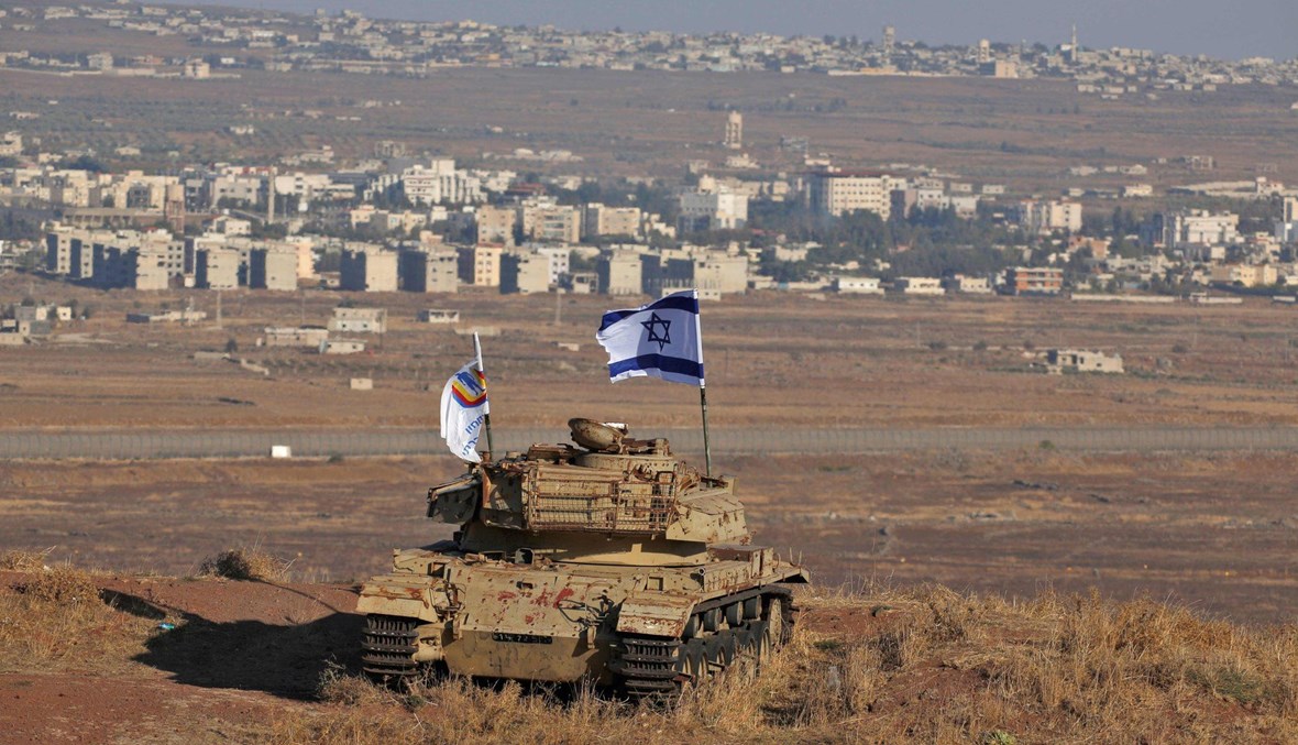 آلية عسكرية إسرائيلية في الجولان (أ ف ب).