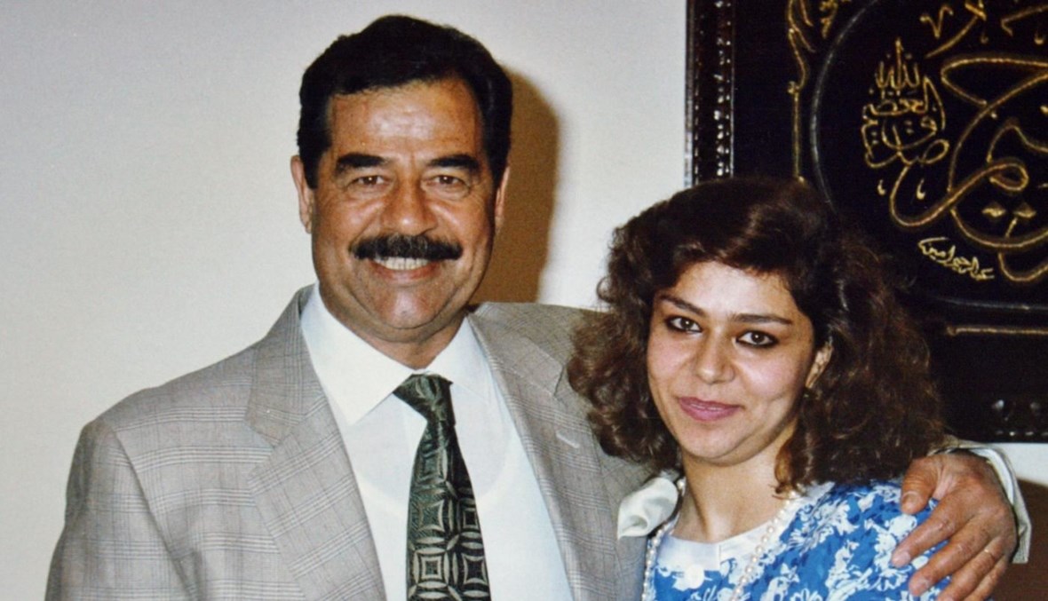 الرئيس العراقي الأسبق صدام حسين وابنته رغد (أرشيفية).