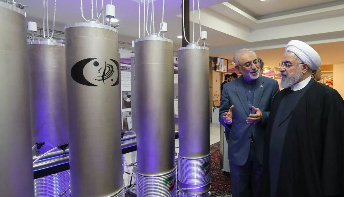 الرئيس الإيراني حسن روحاني خلال فاعليات "يوم التكنولوجيا النووية" في طهران (أ ف ب).