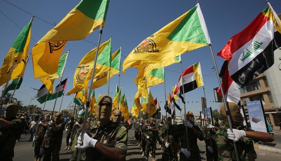 مقاتلون من "كتائب حزب الله العراقي" خلال استعراض بمناسبة يوم القدس العالمي، 31 أيار 2019 - "أ ف ب. السبت الماضي، استهدفت واشنطن مراكز عسكرية لهذه الميليشيات في شرق سوريا"