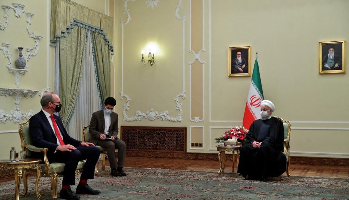 روحاني خلال استقبالة وزير الخارجية الإيرلندي (أ ف ب).