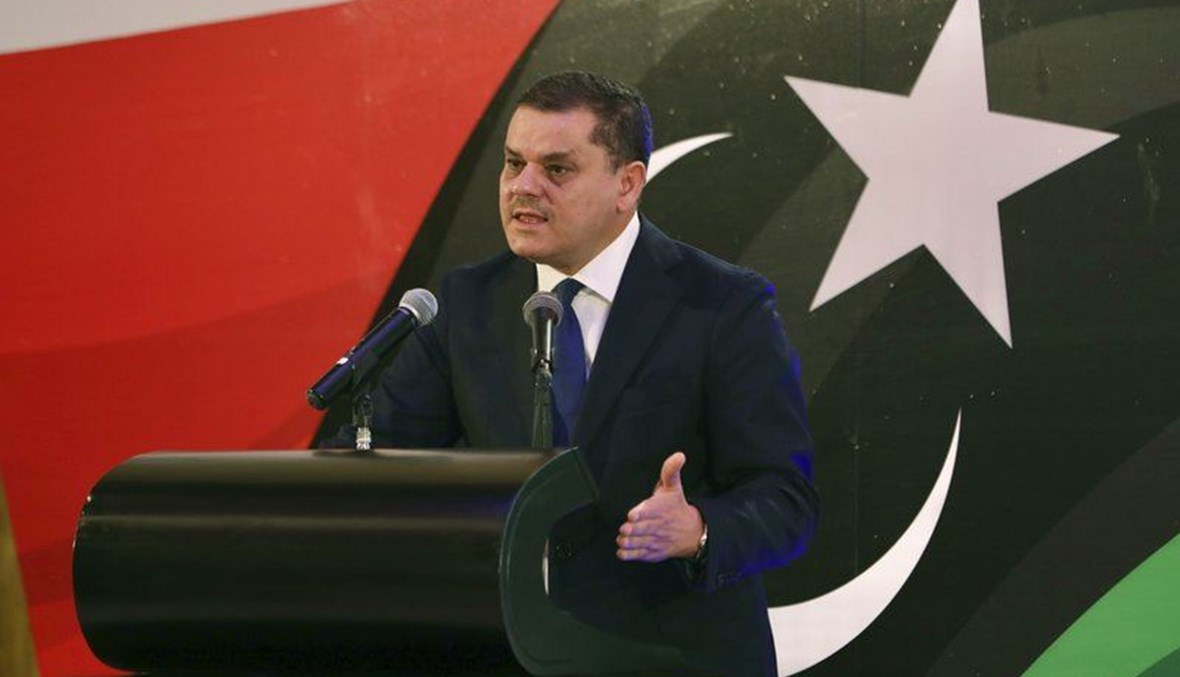 الدبيبة خلال مؤتمر صحافي في طرابلس (25 شباط 2021، أ ب). 
