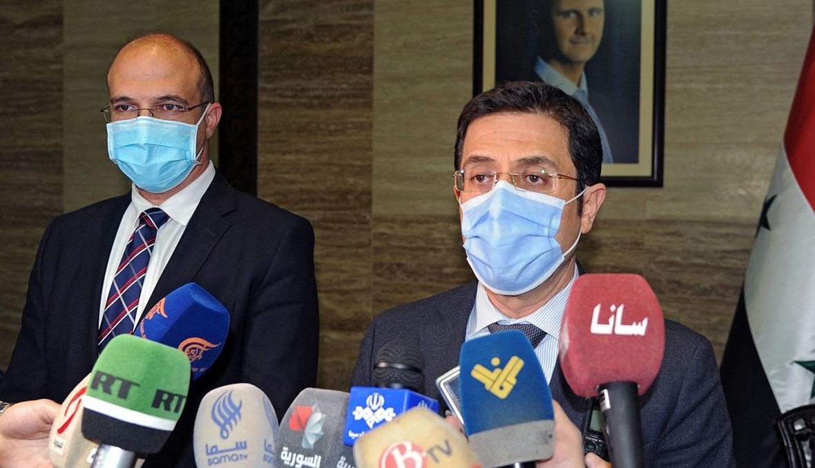 وزيرا الصحة اللبناني والسوري خلال لقاء في دمشق (أ ف ب).