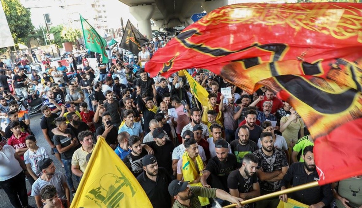 أنصار حزب الله وحركة أمل في الضاحية (أ ف ب). 