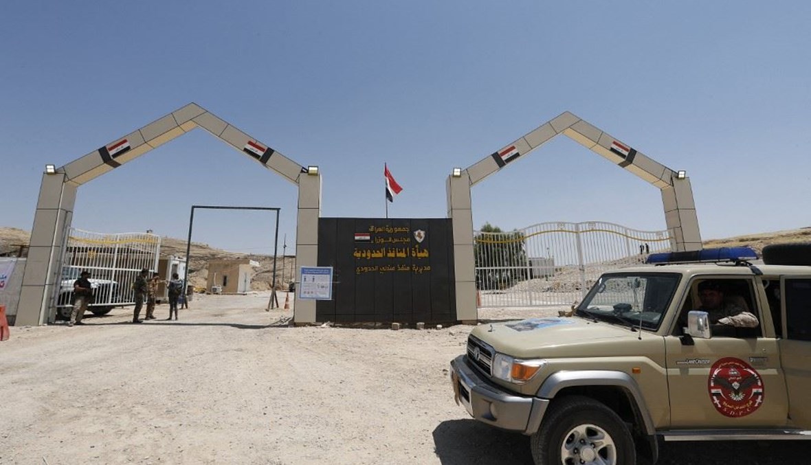 صورة مؤرخة في 11 تموز 2020 سيارة عسكرية للحشد الشعبي في الجانب العراقي من الحدود مع إيران عند معبر ماندلي.   (أ ف ب)