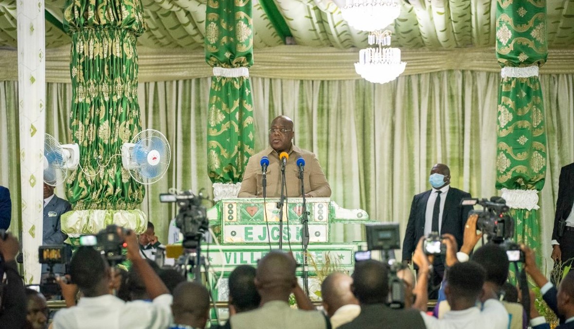 رئيس جمهورية الكونغو الديموقراطية فيليكس تشيسكيدي متكلما في مقر كنيسة كيمبانغيست الدولية في نكامبا خلال احتفال بالذكرى المئوية للكنيسة (6 نيسان 2021، أ ف ب). 