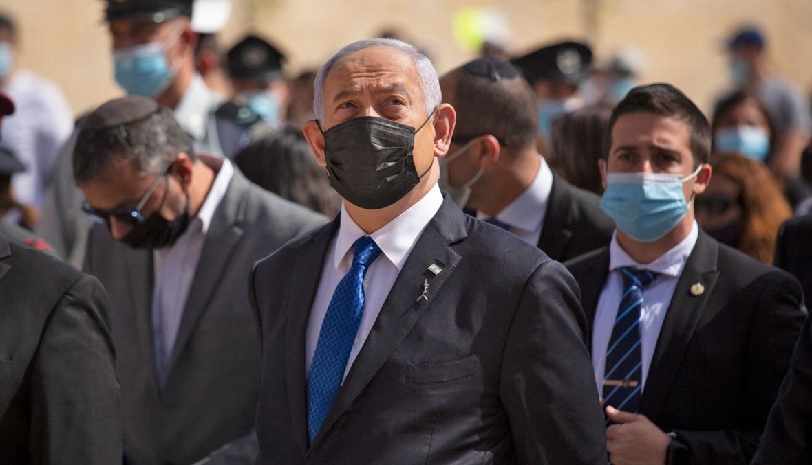 نتنياهو خلال احتفال عند نصب ياد فاشيم التذكاري للهولوكوست في القدس، لإحياء ذكرى المحرقة (8 نيسان 2021، أ ف ب). 