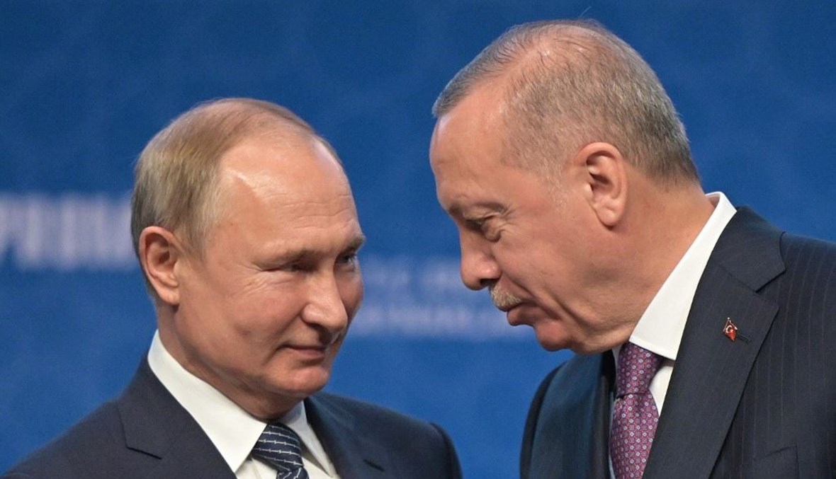 الرئيس الروسي فلاديمير بوتين ونظيره التركي رجب طيب إردوغان (أ ف ب).