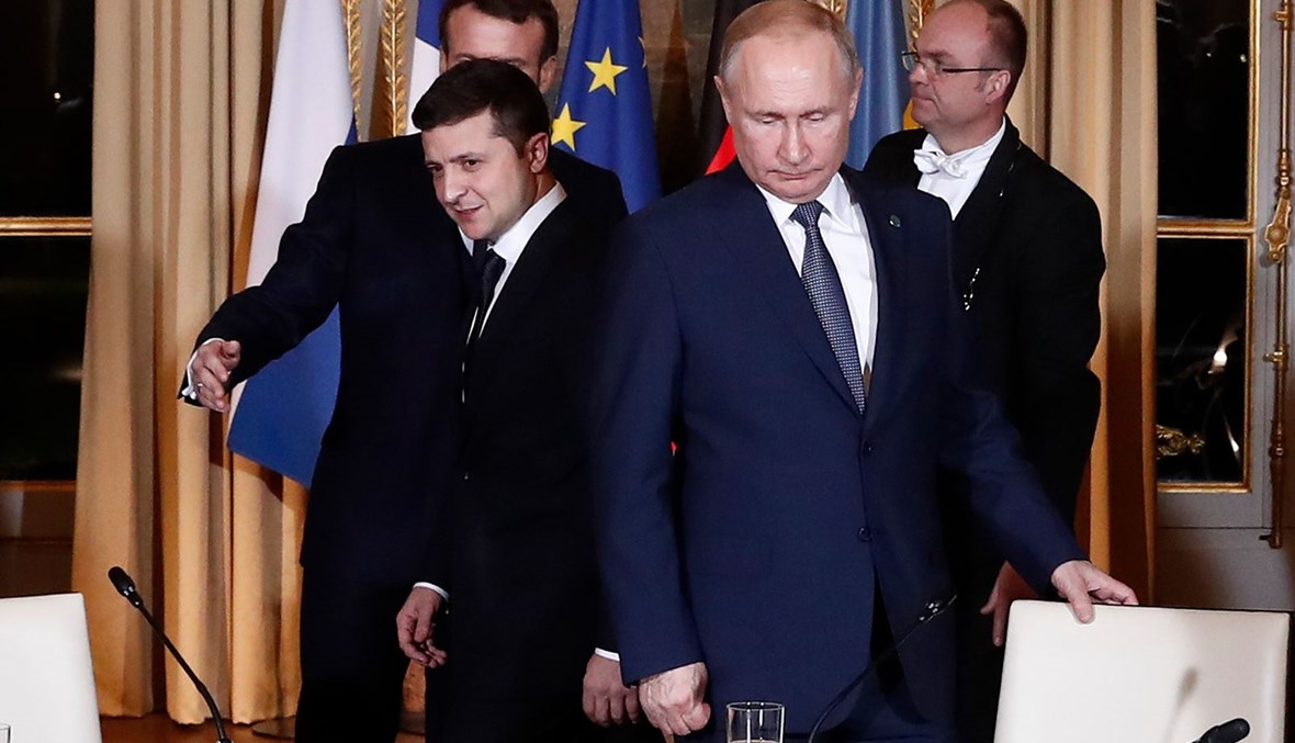 الرئيسان الروسي فلاديمير بوتين والأوكراني فولوديمير زيلينسكي يحضران جلسة عمل في فرنسا ، 9 كانون الأول 2019 - "أ ب