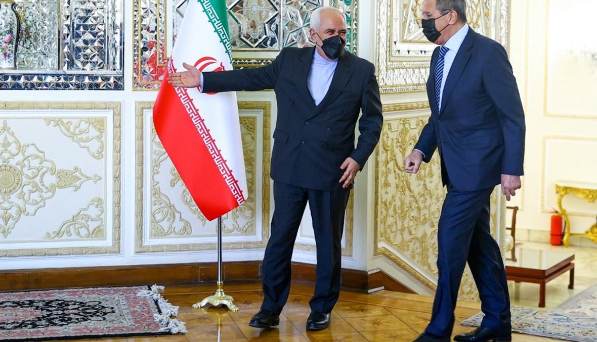 لقاء لافروف وظريف في طهران (أ ف ب).