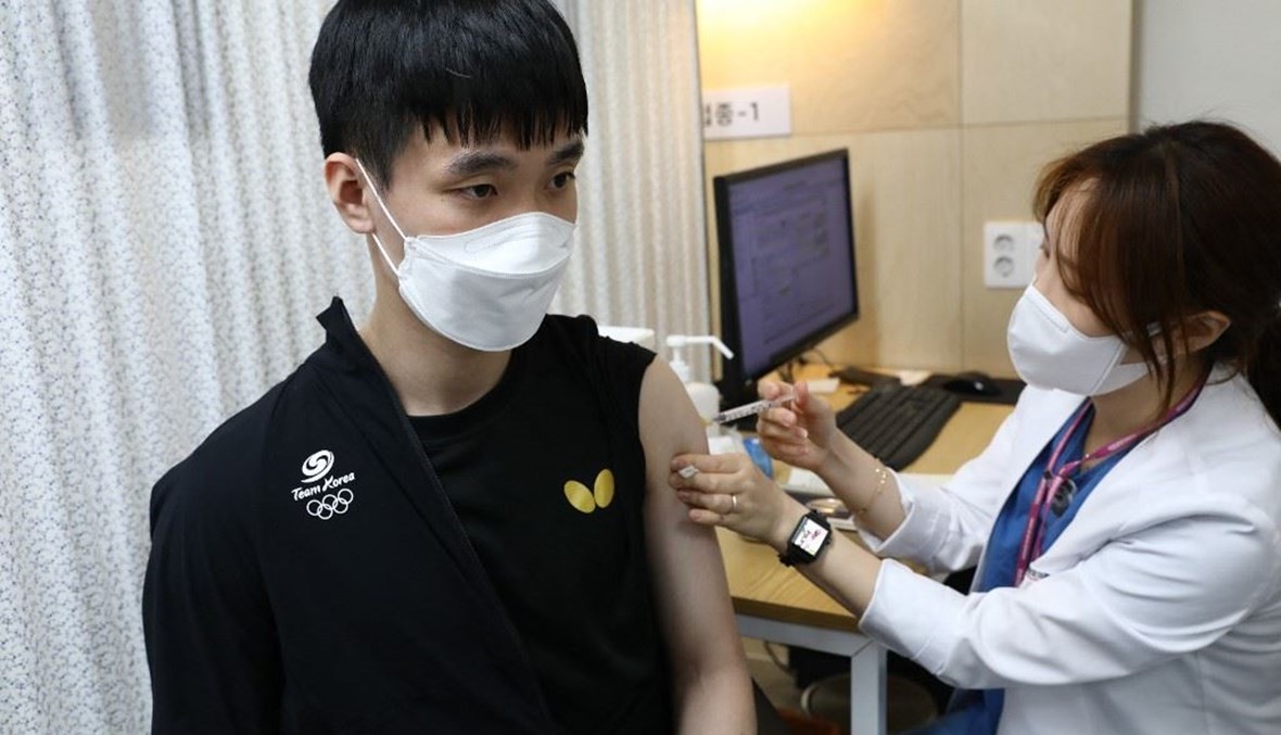 التطعيم في كوريا الجنوبية (أ ف ب).