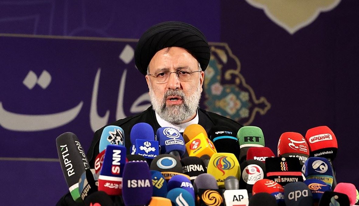 رئيس السلطة القضائية الايرانية ابرهيم رئيسي يتحدث بعد تقديم ترشيحه للاننتخابات الرئاسية في طهران السبت.(أ ف ب)