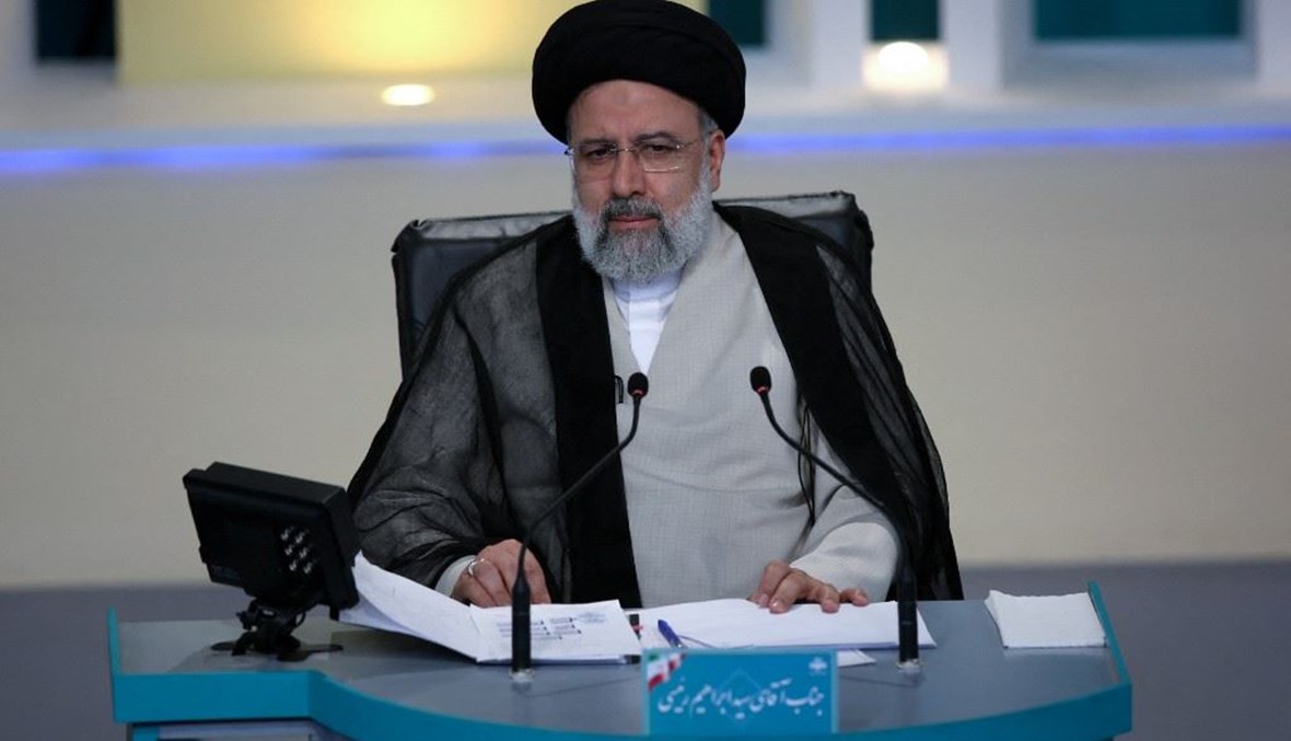 المرشح للانتخابات الرئاسية الإيرانية ابرهيم رئيسي خلال مناظرة تلفزيونية بين المرشحين السبت.(أ ف ب)