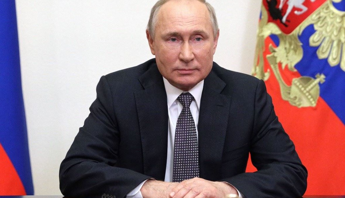 الرئيس الروسي فلاديمير بوتين خلال توجيهه رسالة إلى مؤتمر موسكو للأمن الدولي أمس. (أ ف ب)