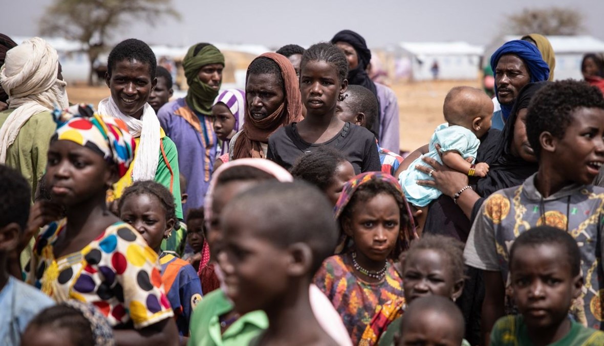 لاجئون في مخيم غودوبو في شمال بوركينا فاسو (20 حزيران 2021، أ ف ب). 