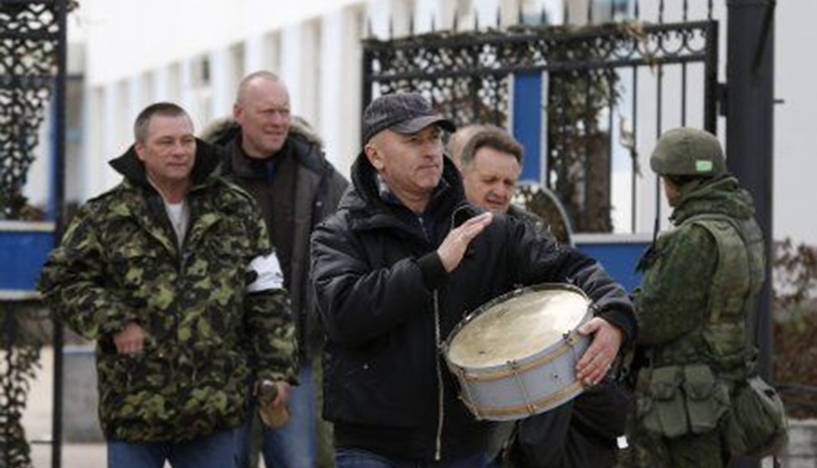 القوات الروسية تحتل قاعدة اوكرانية ثانية في القرم وبان في موسكو غداً