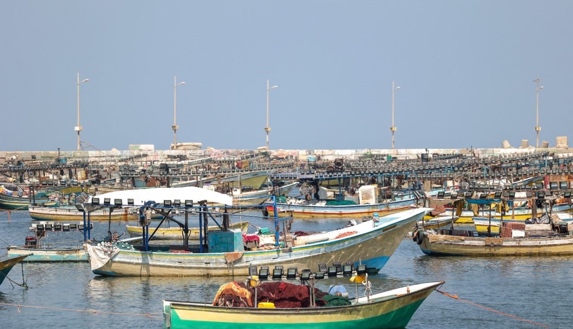 قوارب صيد فلسطينية ترسو في ميناء مدينة غزة (11 تموز 2021، أ ف ب). 