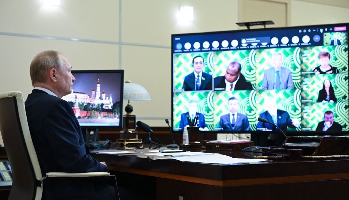 بوتين مشاركا في اجتماع "آييك"، عبر الفيديو، في مقر الإقامة نوفو- أوغاريوفو الحكومي خارج موسكو (16 تموز 2021، ا ف ب). 