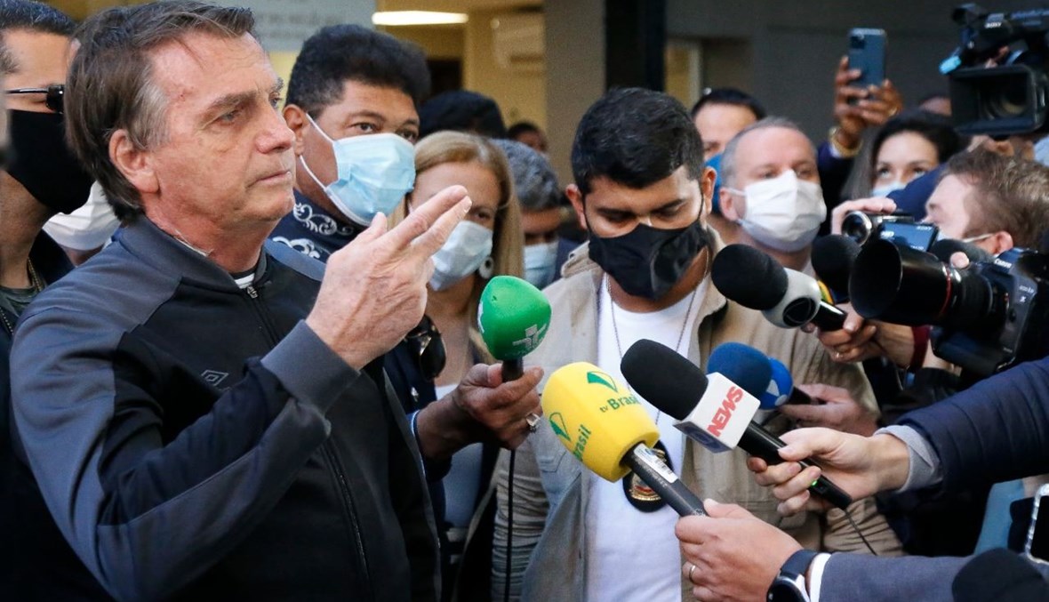 بولسونارو متكلما خلال مؤتمر صحافي في مستشفى فيلا نوفا ستار في ساو باولو بالبرازيل (18 تموز 2021، أ ف ب). 