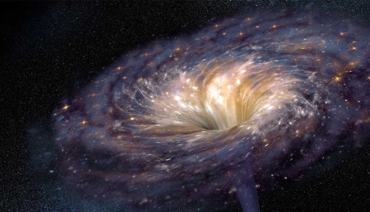 علماء فلك يرصدون  للمرة الاولى ضوءاً خلف  ثقب أسود عملاق