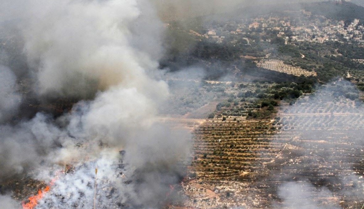 مكان سقوط صوايخ اسرائيلية في جنوب لبنان  (ا ف ب)