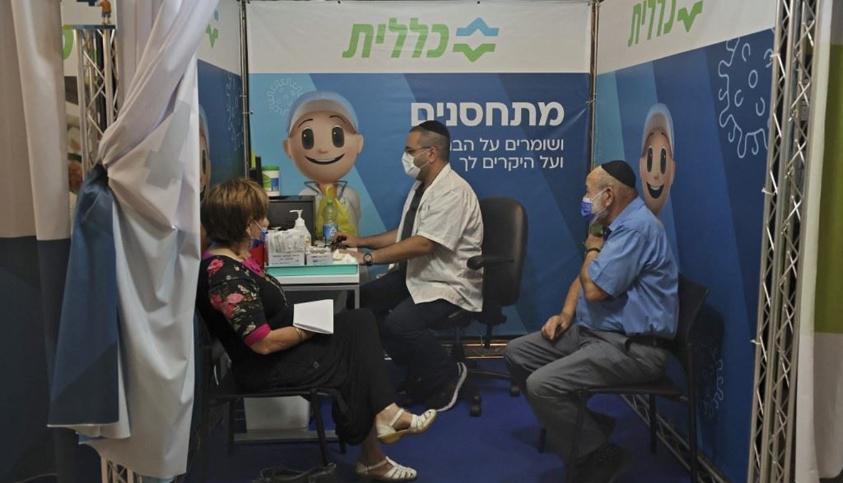 حملة التطعيم في إسرائيل (أ ف ب).