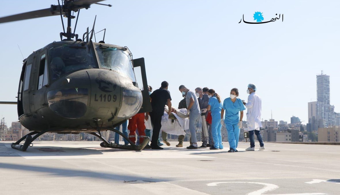 لحظة هبوط مروحية الجيش فوق مستشفى الجعيتاوي لنقل مصابين انفجار التليل (حسن عسل).