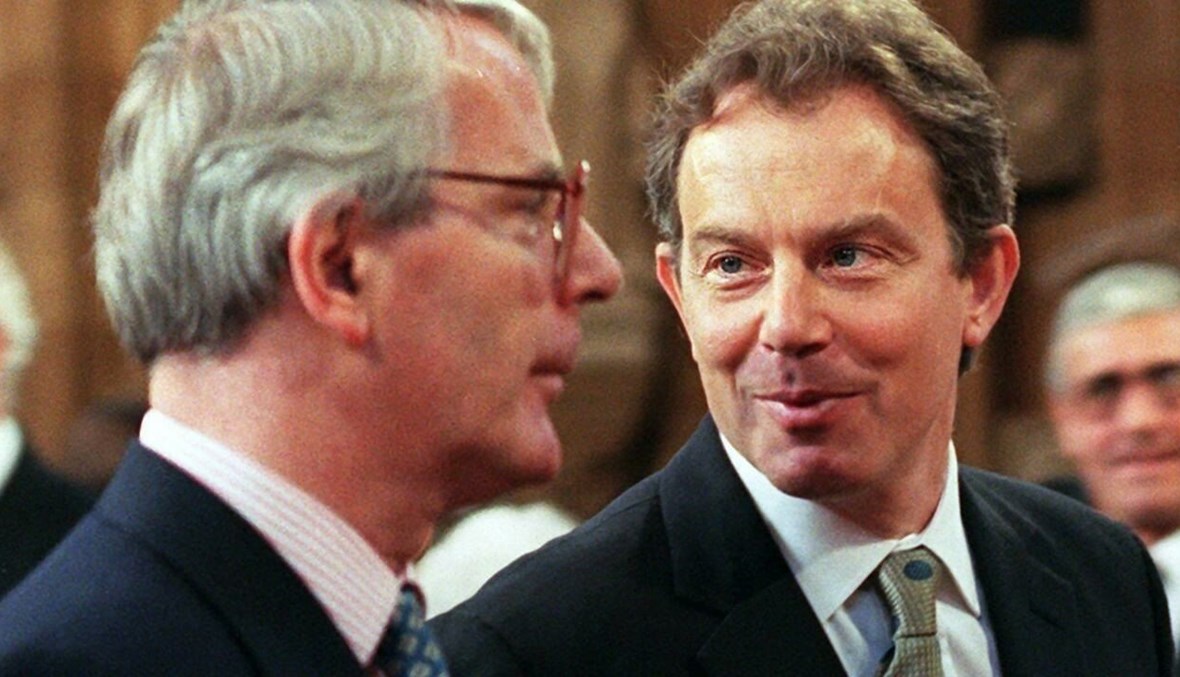توني بلير وجون ميجور في البرلمان (أ ف ب).
