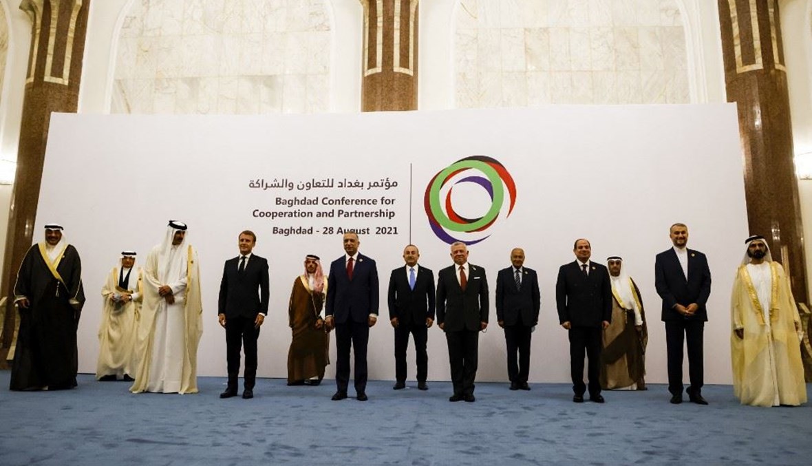 صورة جماعية للقادة والرؤساء المجتمعين في مؤتمر بغداد (صور)