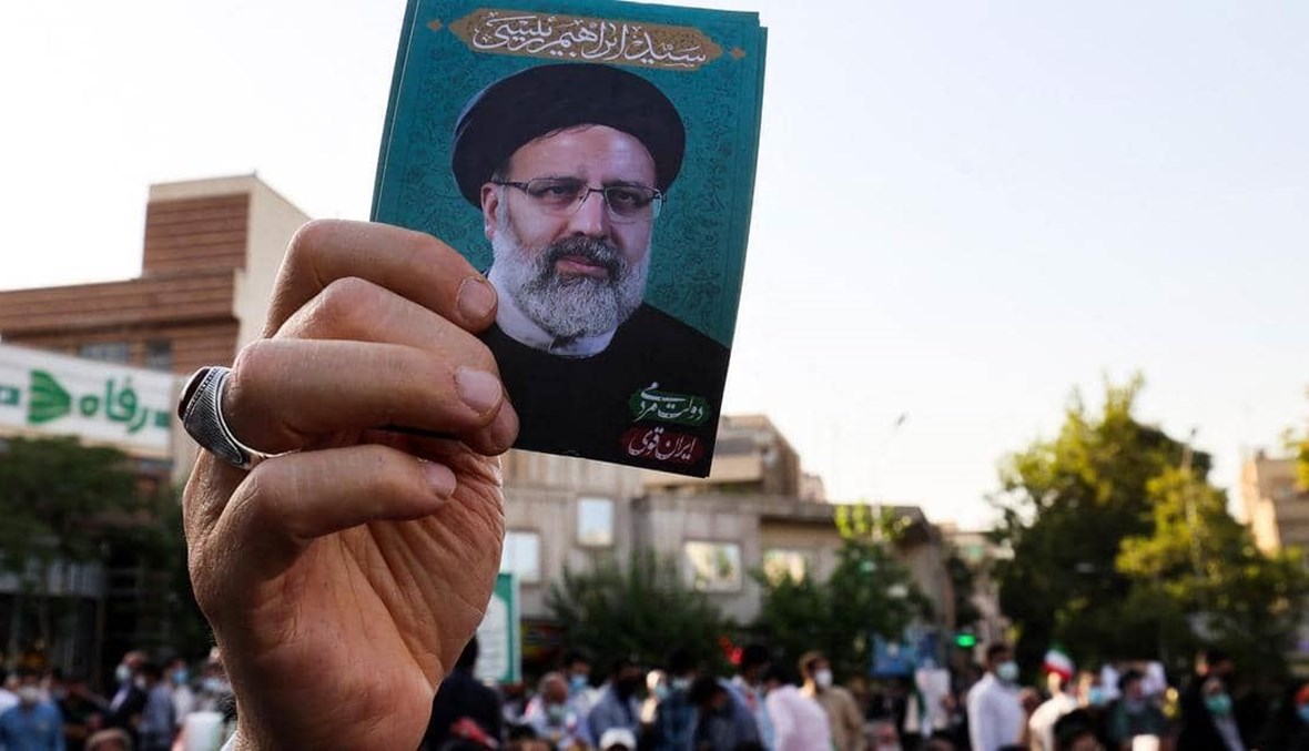 خلال الحملة الانتخابية دعماً للرئيس الإيراني ابراهيم رئيسي (أ ف ب).
