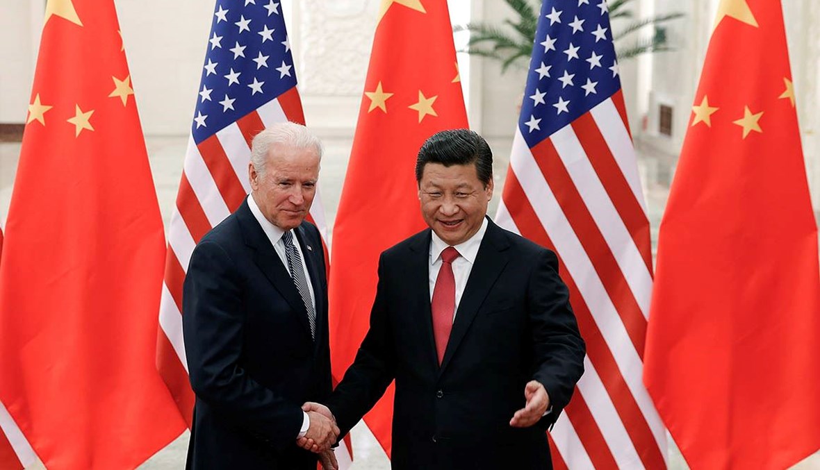 الرئيس الصيني شي جينبينغ ونائب الرئيس حينها جو بايدن، 2013 - "أ ف ب"