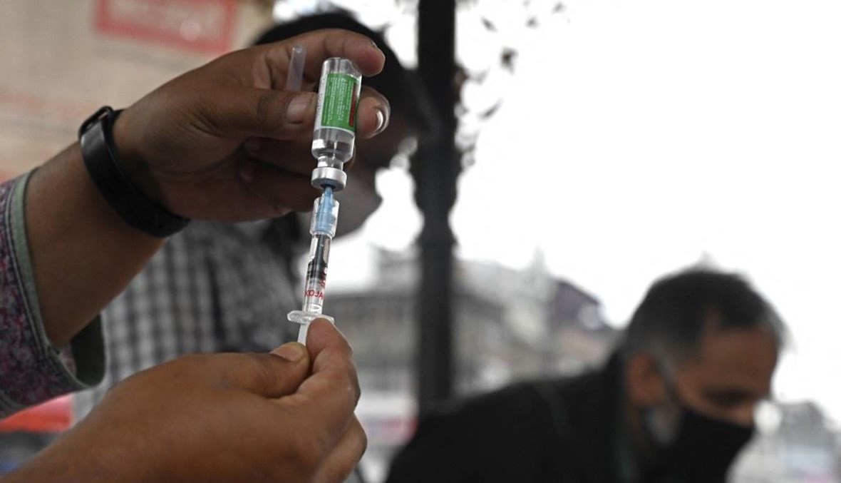 اللقاح في الهند (أ ف ب).