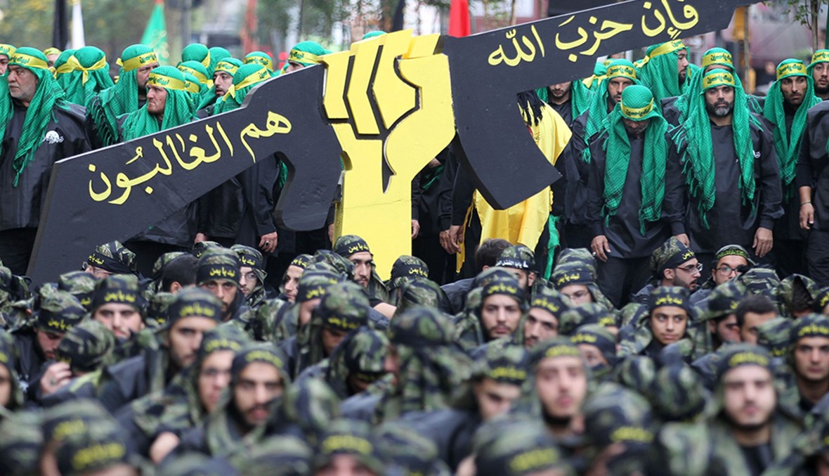 مشهد من مسيرة لـ"حزب الله" في الضاحية الجنوبية لبيروت (أ ف ب).